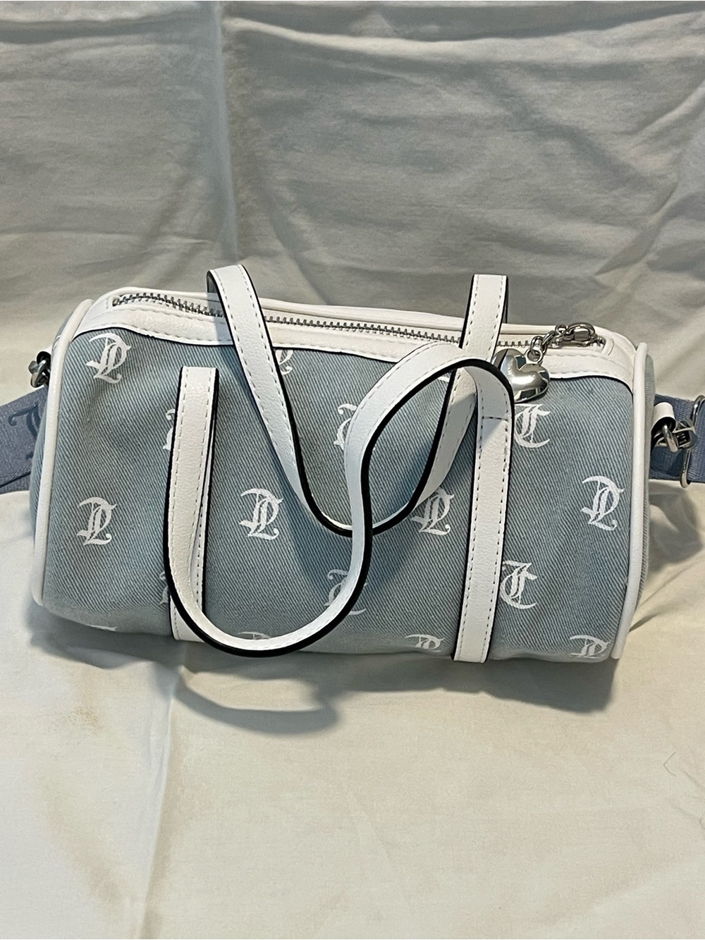 Juicy Couture Light Gray Barrel Duffel with White Trim and Navy Strap - Picture 6 of 9